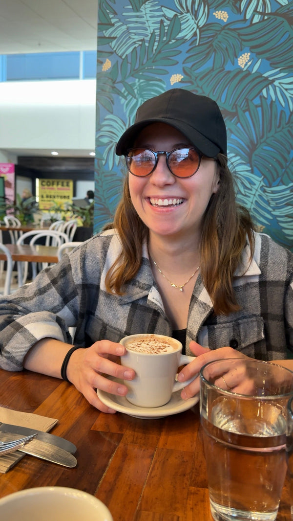 women with glasses and a cup